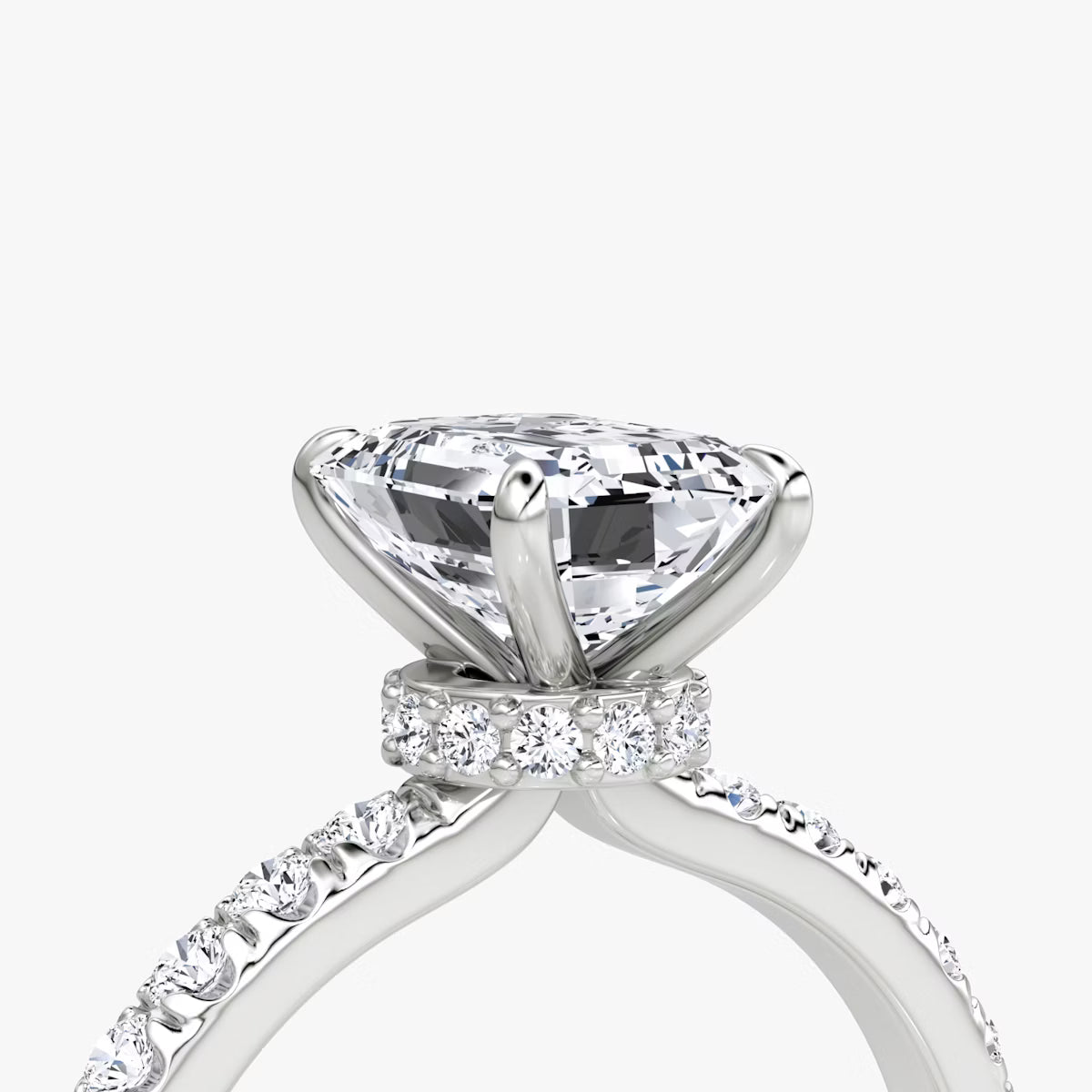 Emerald Secret Halo Diamond Ring with Pavé Setting