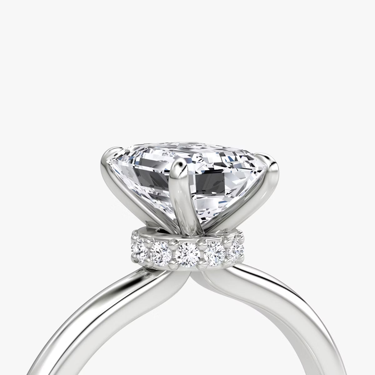 Emerald Secret Halo Diamond Ring
