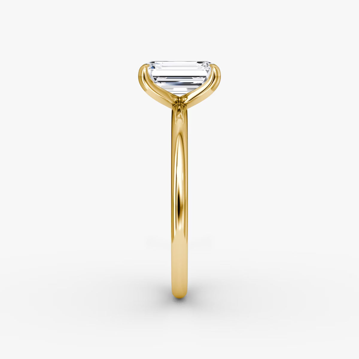 The Classic Emerald Solitaire Diamond Ring