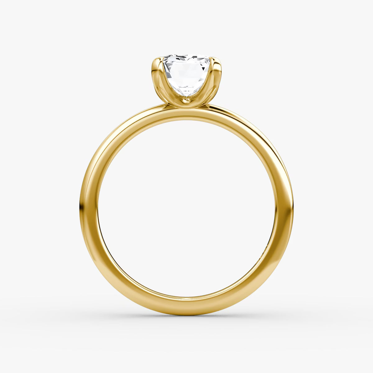 The Classic Emerald Solitaire Diamond Ring
