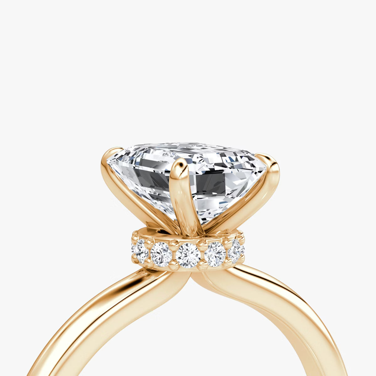 Emerald Secret Halo Diamond Ring