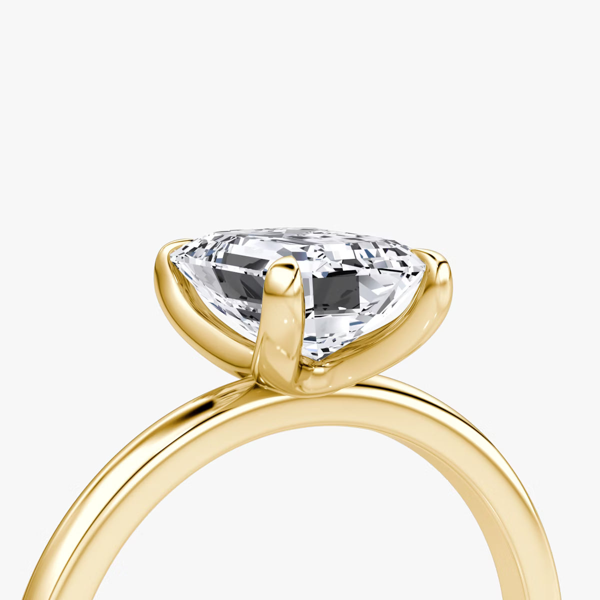 The Classic Emerald Solitaire Diamond Ring