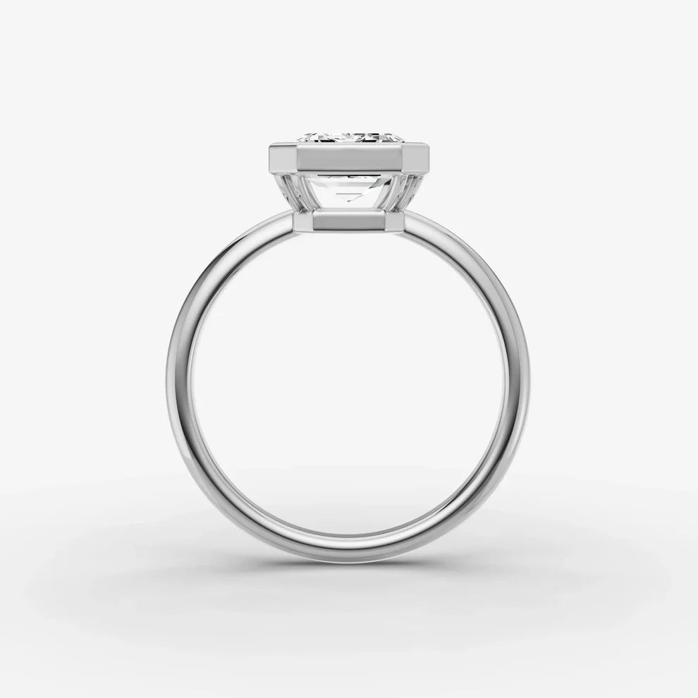 Emerald Bezel Diamond Ring