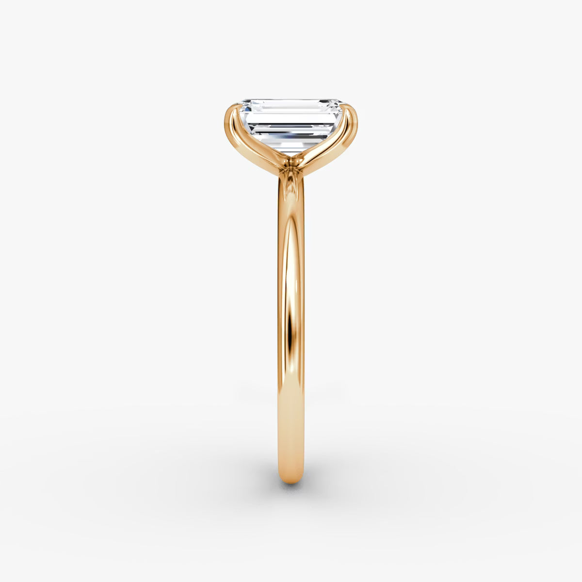 The Classic Emerald Solitaire Diamond Ring