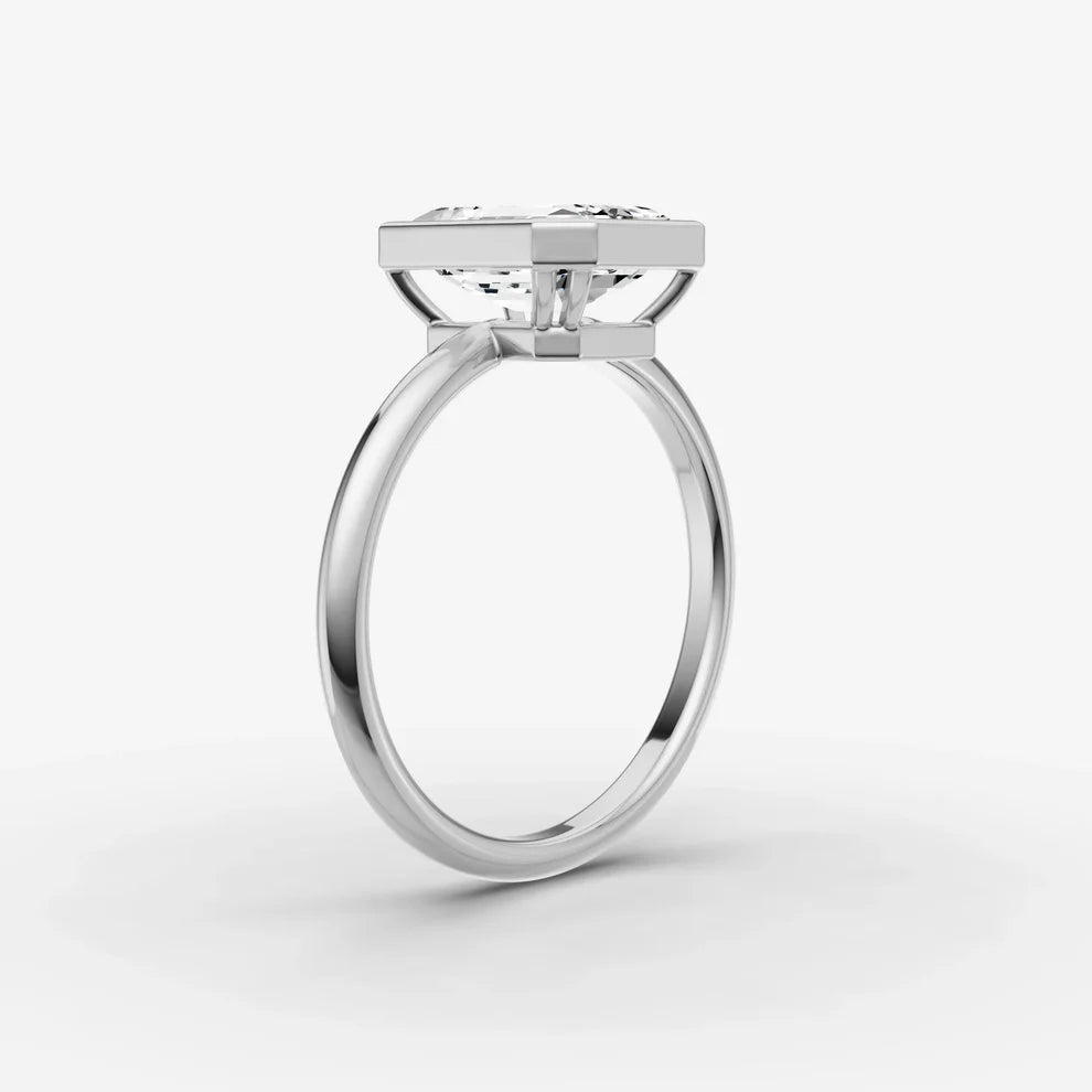 Emerald Bezel Diamond Ring