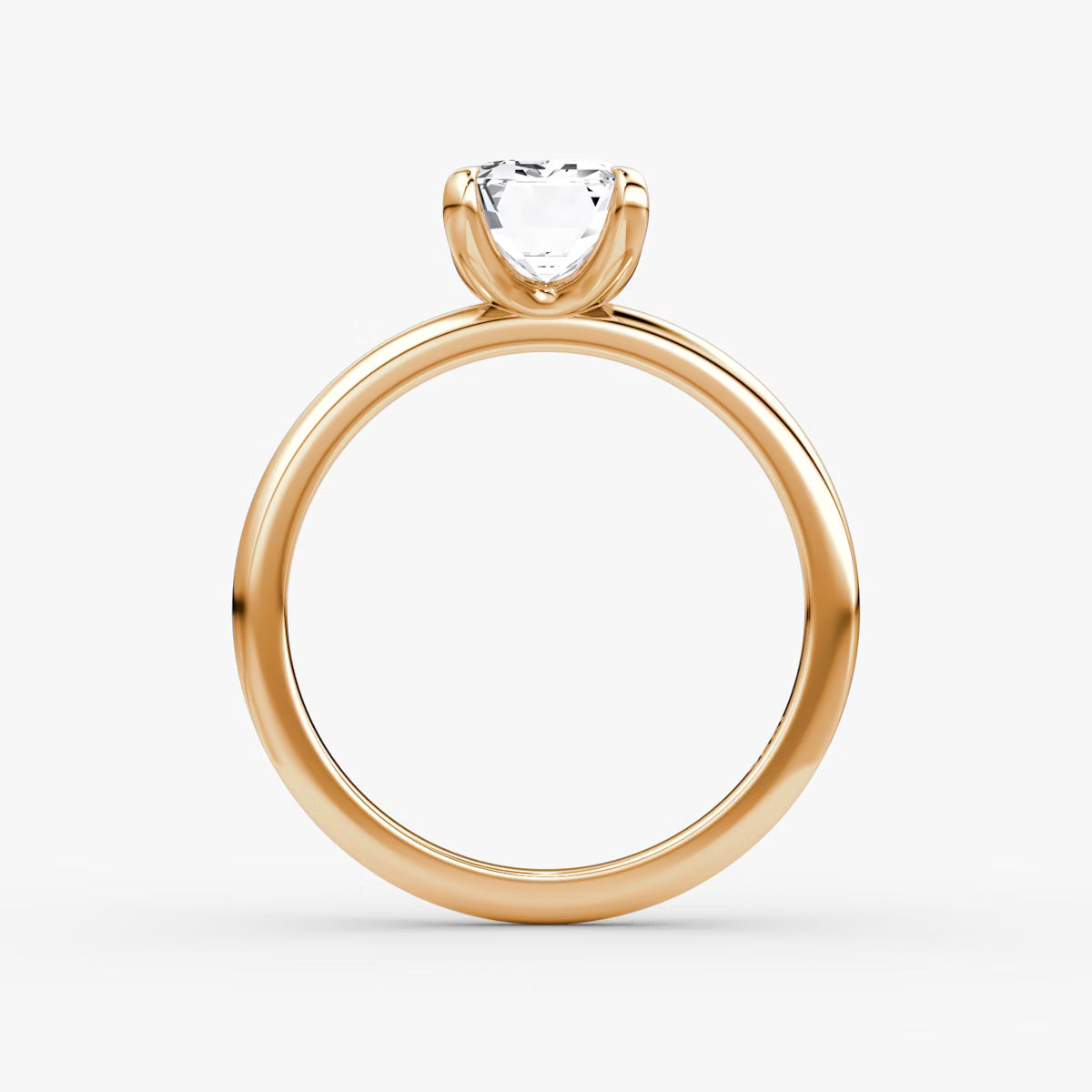 The Classic Emerald Solitaire Diamond Ring