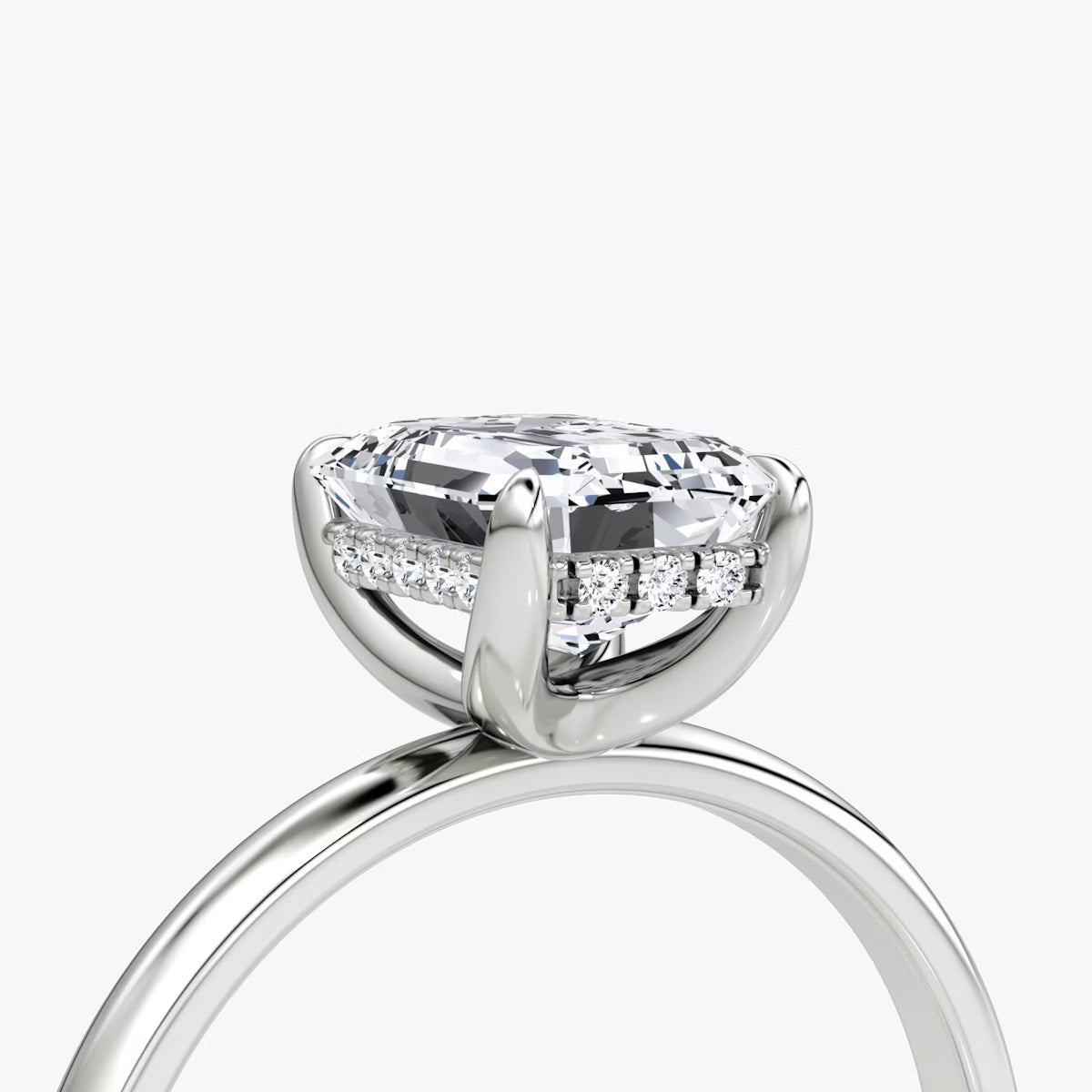 Emerald Hidden Halo Diamond Ring