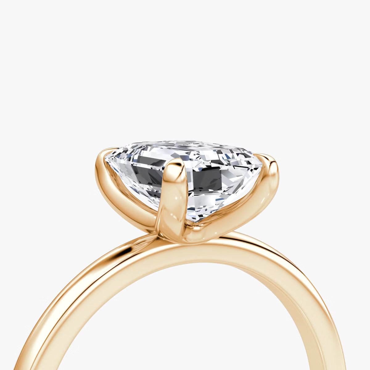 The Classic Emerald Solitaire Diamond Ring