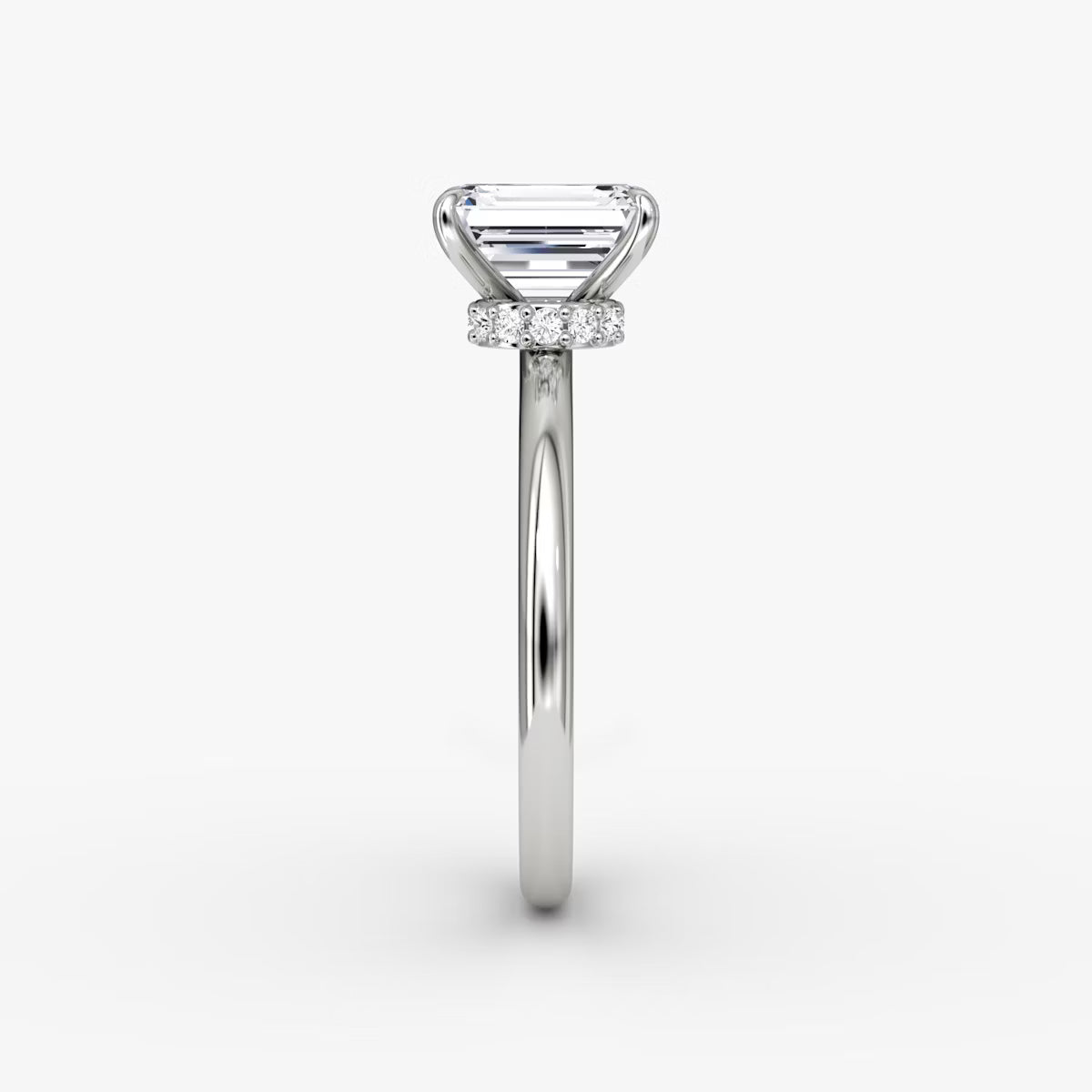 Emerald Secret Halo Diamond Ring