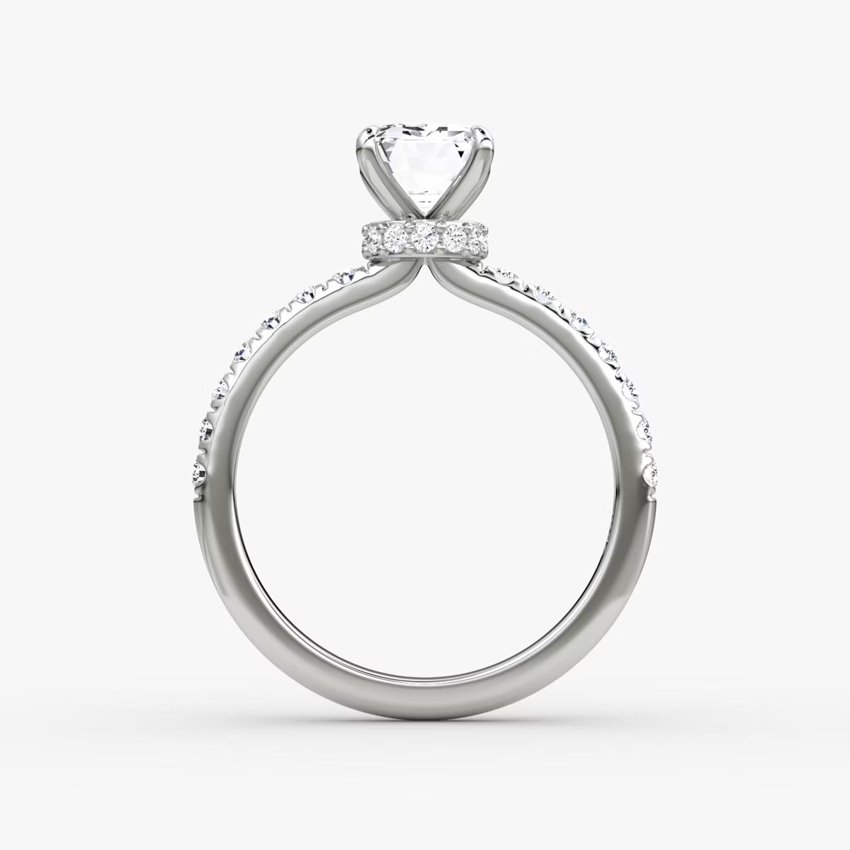 Emerald Secret Halo Diamond Ring with Pavé Setting