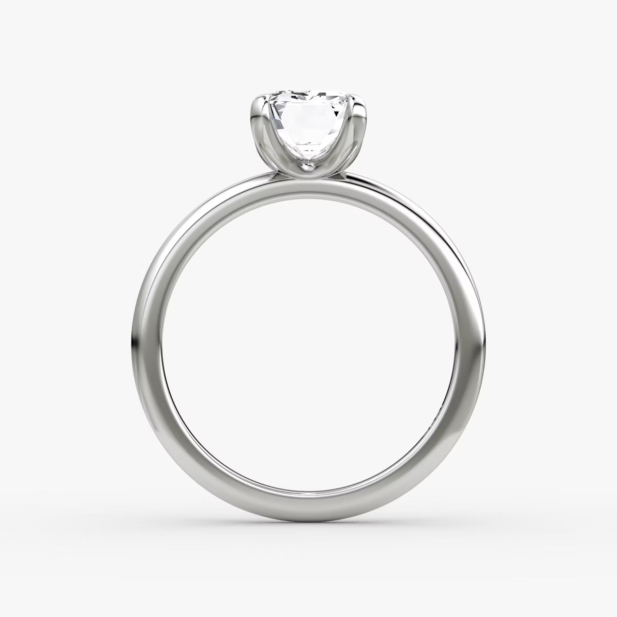 The Classic Emerald Solitaire Diamond Ring