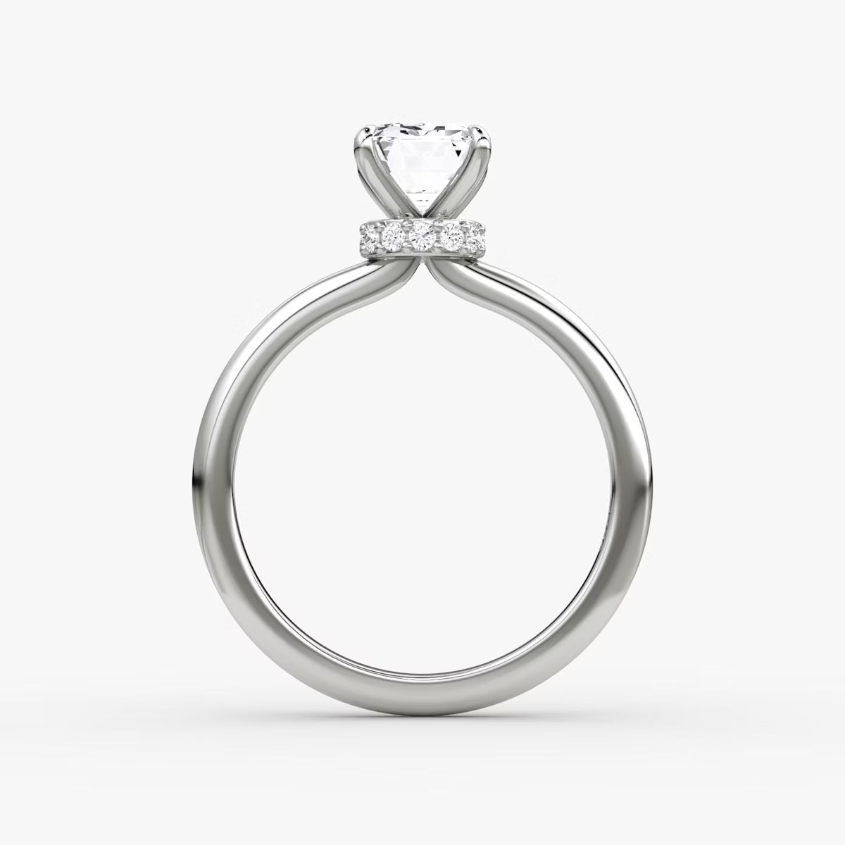 Emerald Secret Halo Diamond Ring