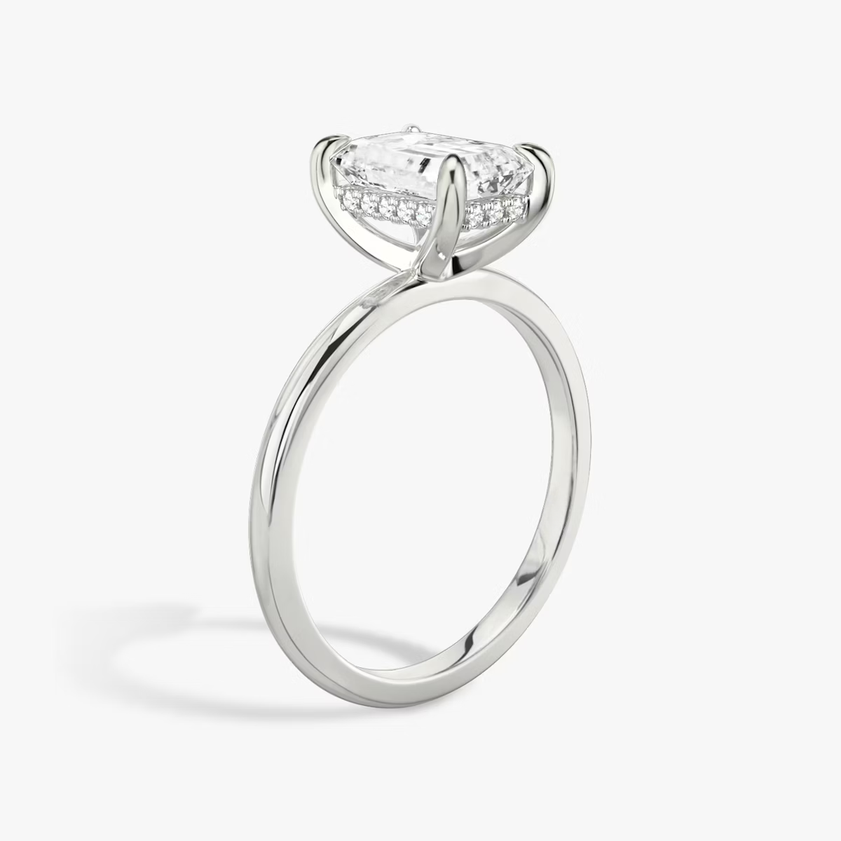 Emerald Hidden Halo Diamond Ring