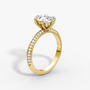 The Sculpted Emerald Hidden Halo Diamond Ring with Pavé Setting