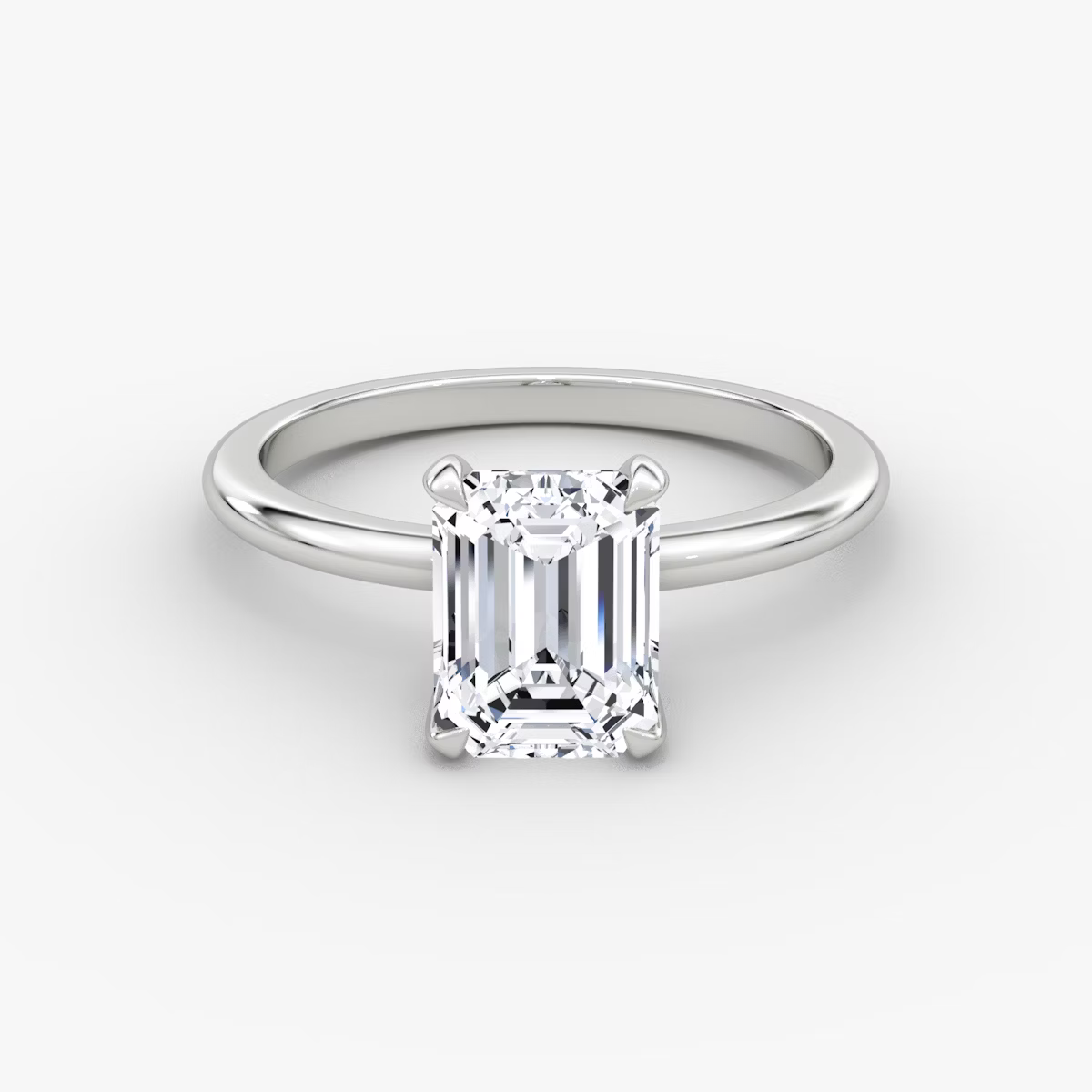 The Classic Emerald Solitaire Diamond Ring