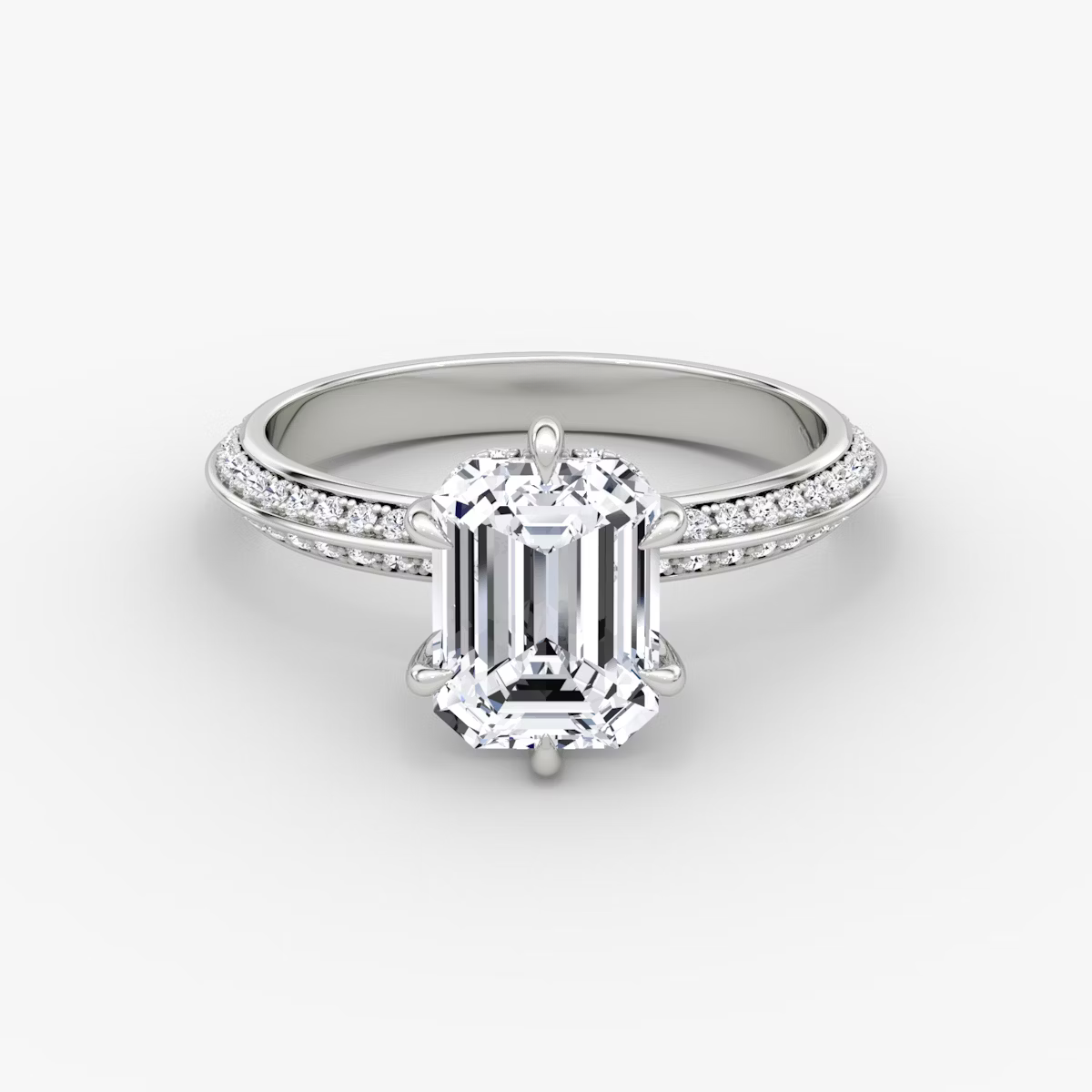 The Sculpted Emerald Hidden Halo Diamond Ring with Pavé Setting