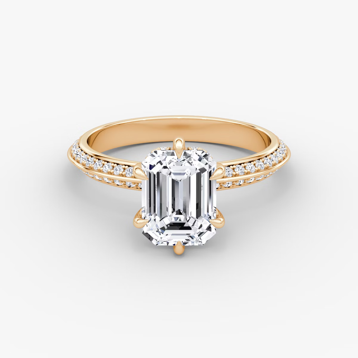 The Sculpted Emerald Hidden Halo Diamond Ring with Pavé Setting