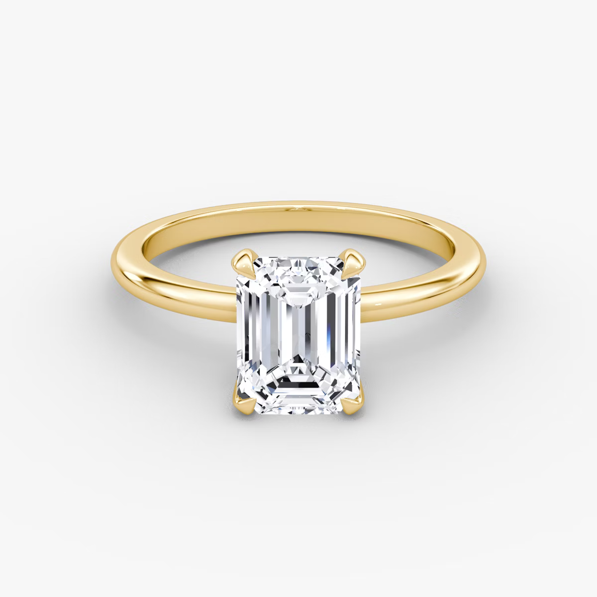 The Classic Emerald Solitaire Diamond Ring