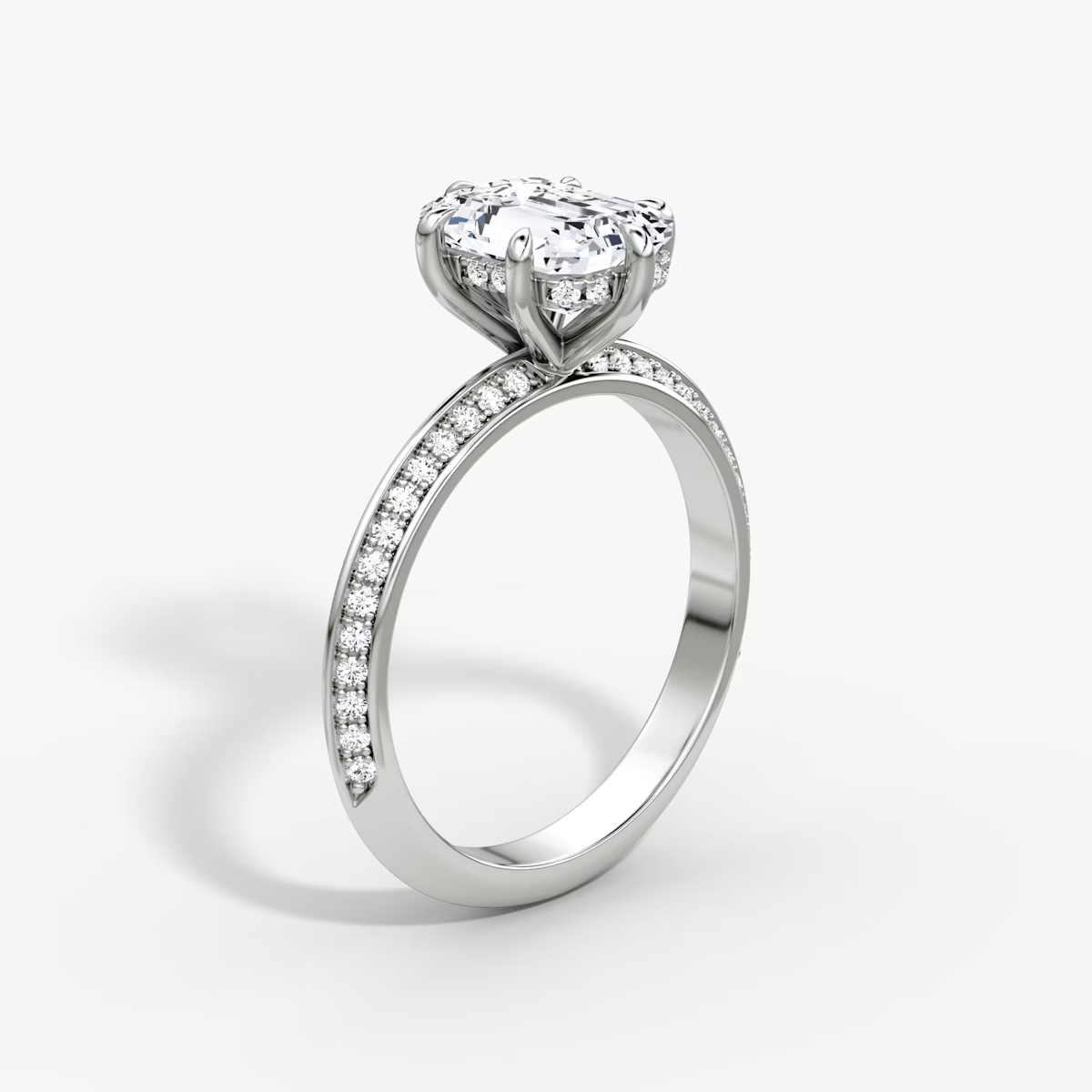 The Sculpted Emerald Hidden Halo Diamond Ring with Pavé Setting