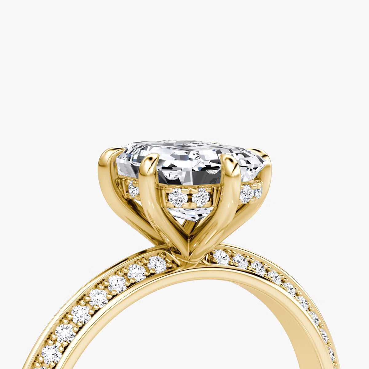 The Sculpted Emerald Hidden Halo Diamond Ring with Pavé Setting