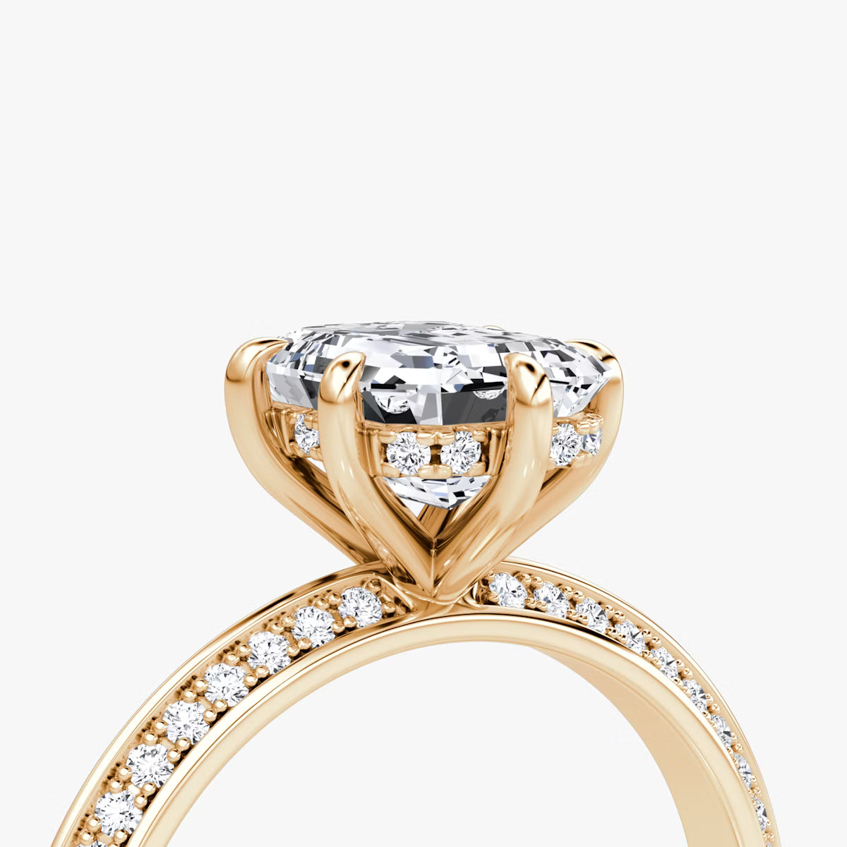 The Sculpted Emerald Hidden Halo Diamond Ring with Pavé Setting