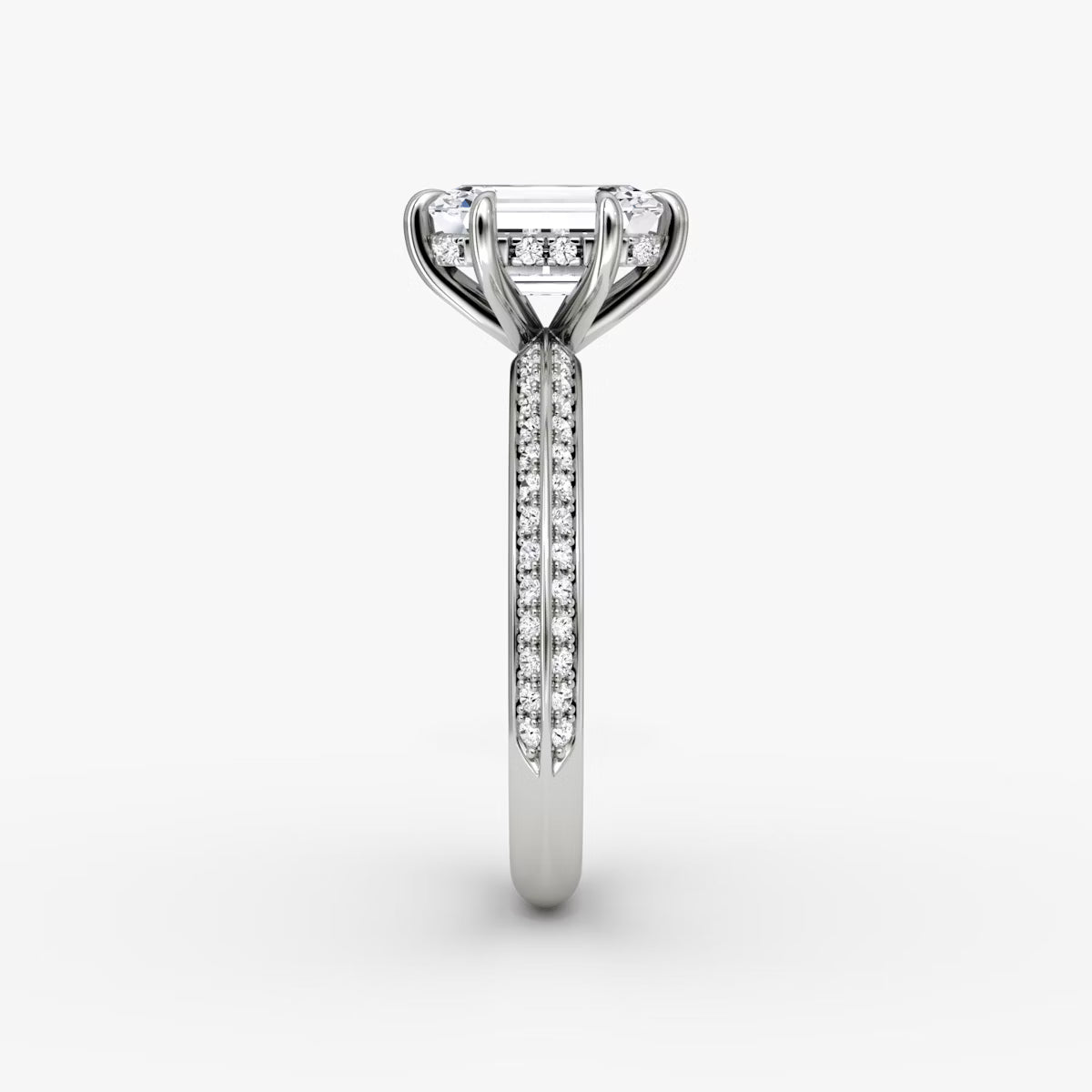 The Sculpted Emerald Hidden Halo Diamond Ring with Pavé Setting