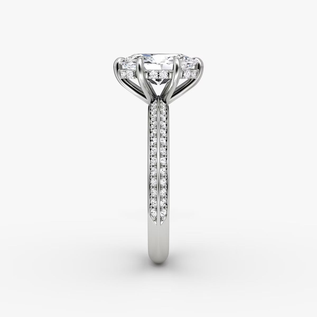 The Sculpted Oval Hidden Halo Diamond Ring with Pavé Setting