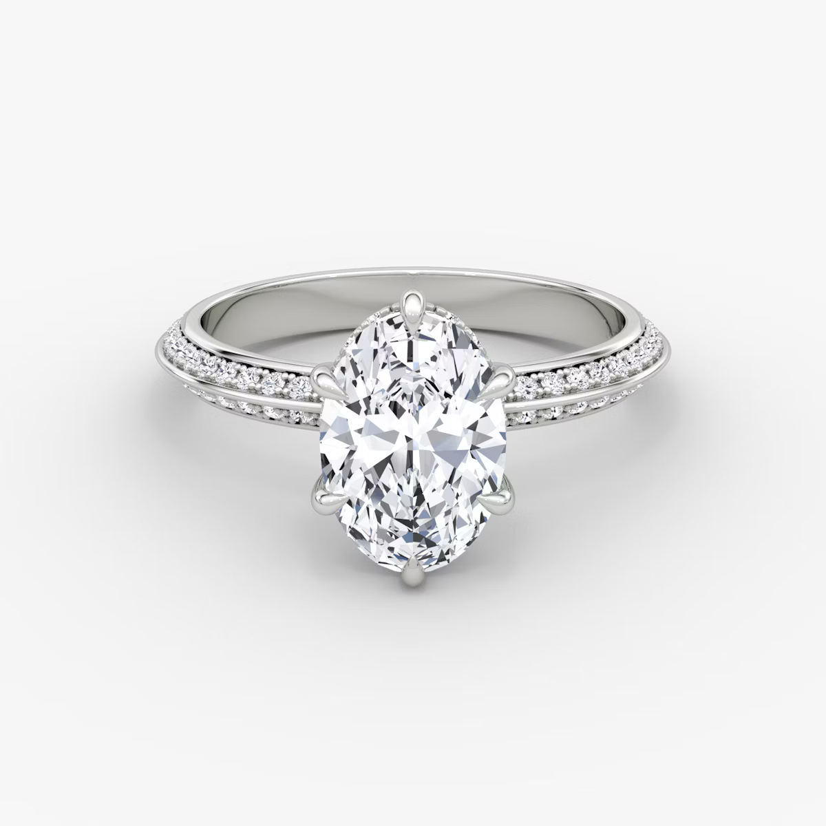 The Sculpted Oval Hidden Halo Diamond Ring with Pavé Setting