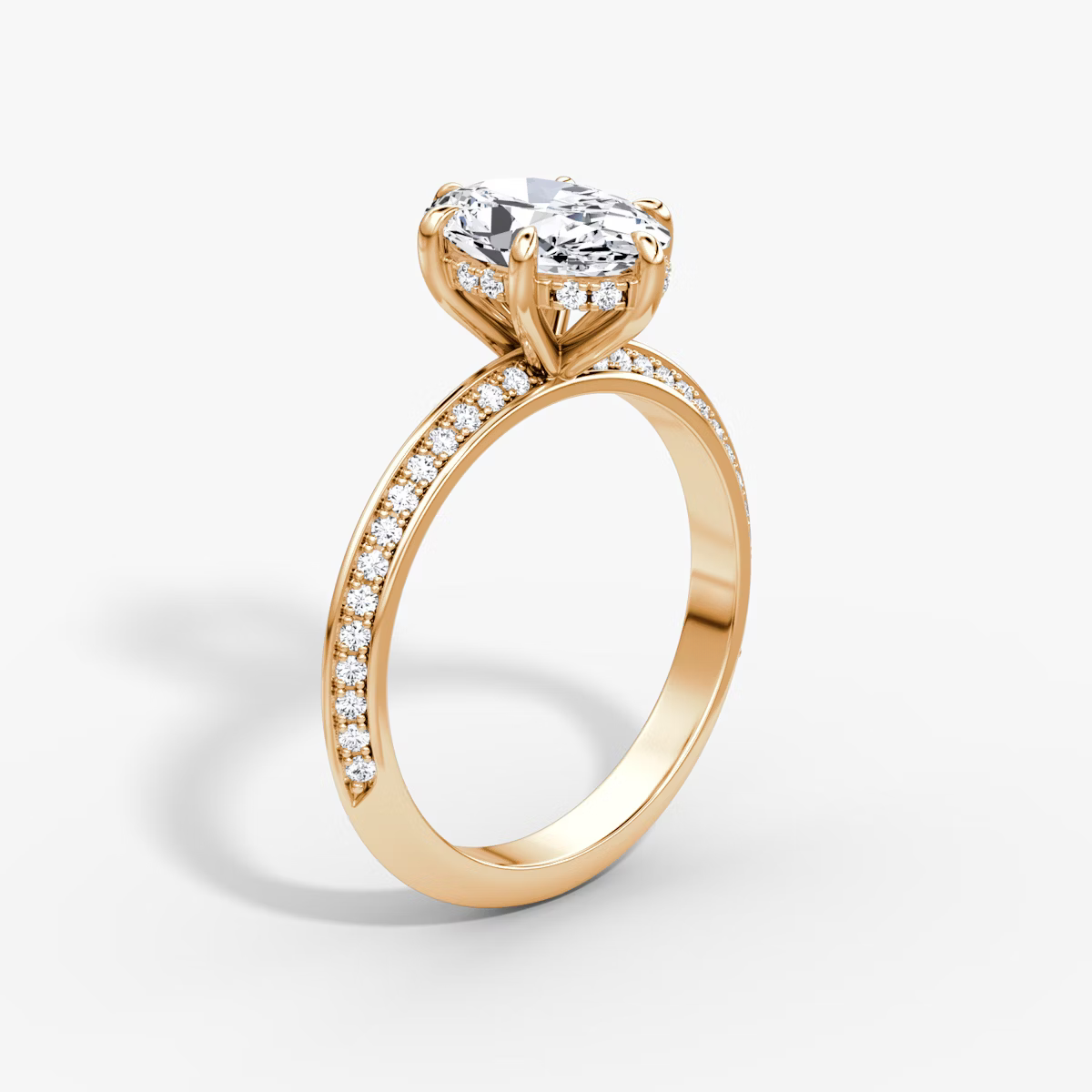The Sculpted Oval Hidden Halo Diamond Ring with Pavé Setting