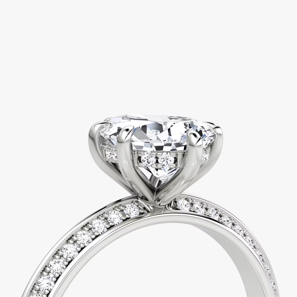 The Sculpted Pear Hidden Halo Diamond Ring with Pavé Setting