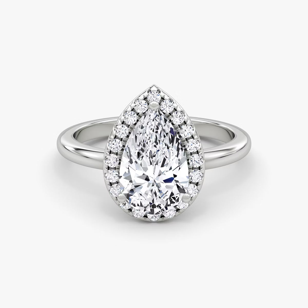 The Halo Pear Diamond Ring