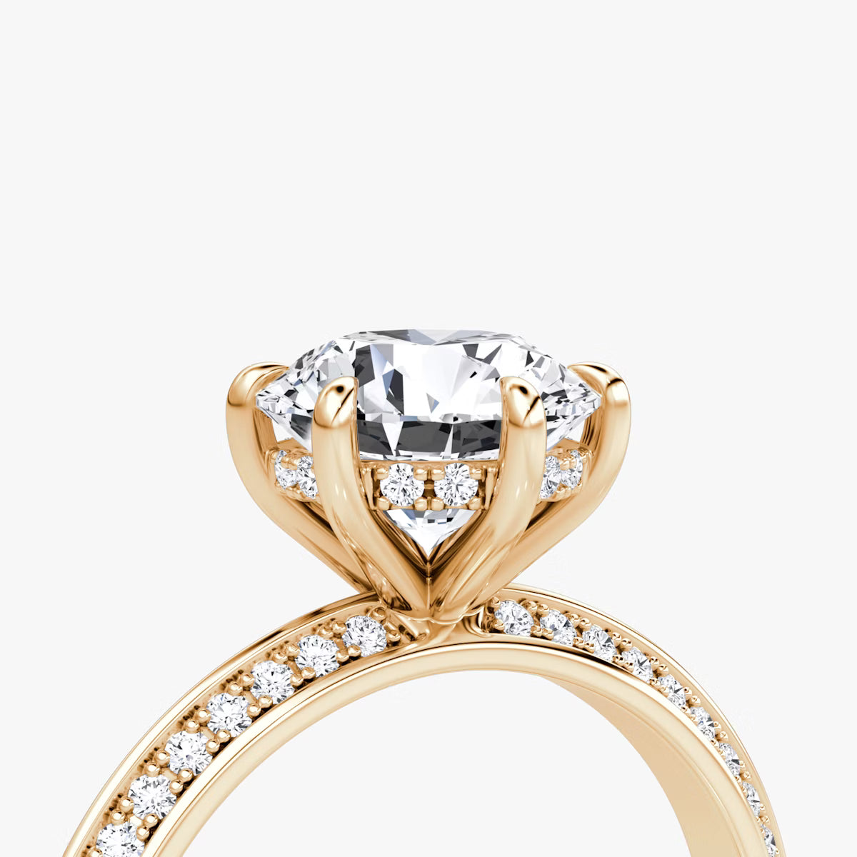 The Sculpted Oval Hidden Halo Diamond Ring with Pavé Setting