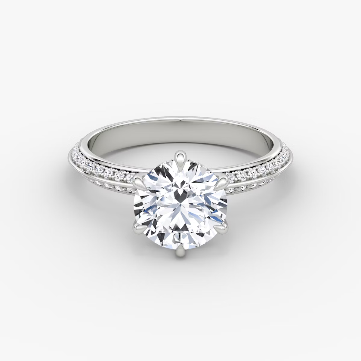 The Sculpted Round Hidden Halo Diamond Ring with Pavé Setting