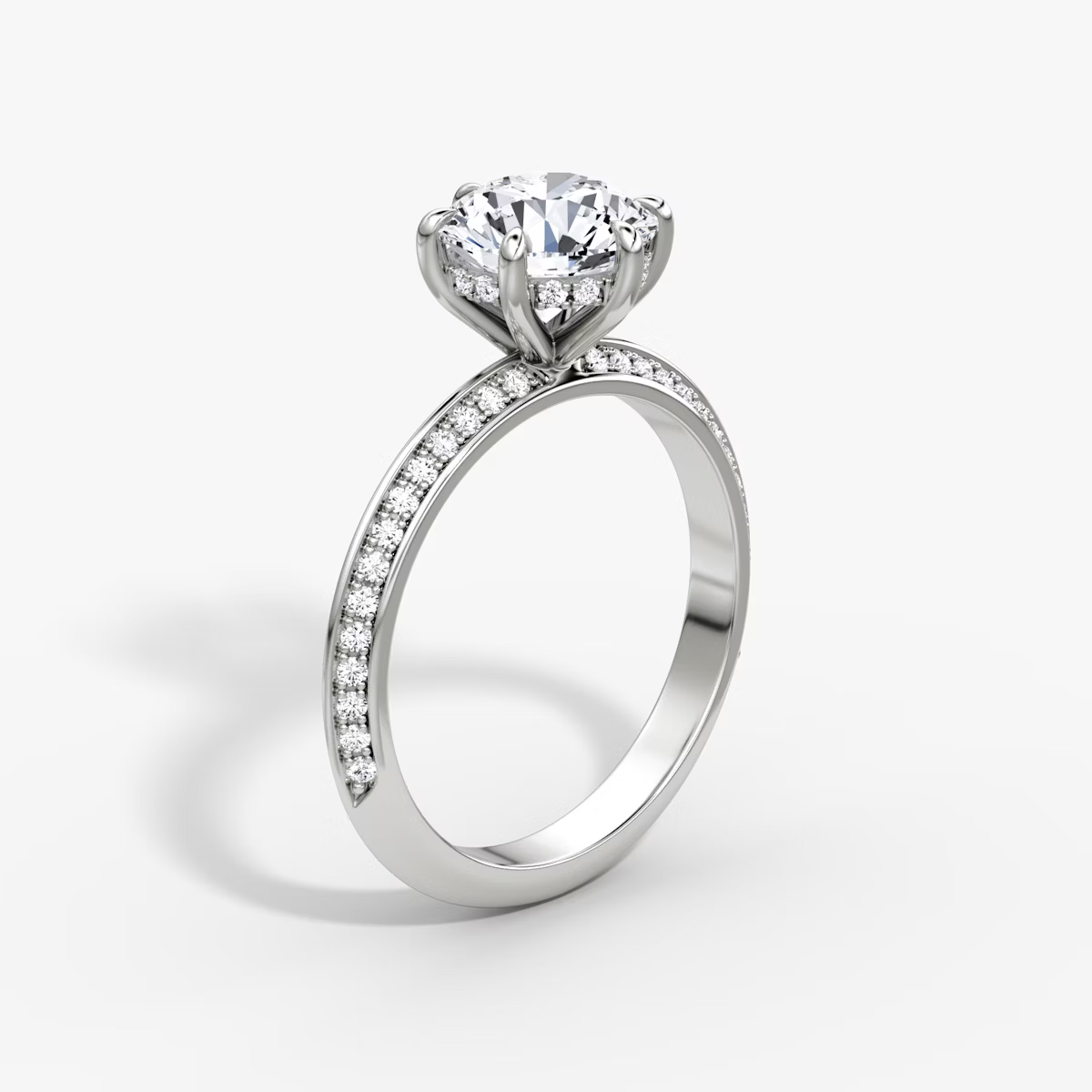 The Sculpted Round Hidden Halo Diamond Ring with Pavé Setting