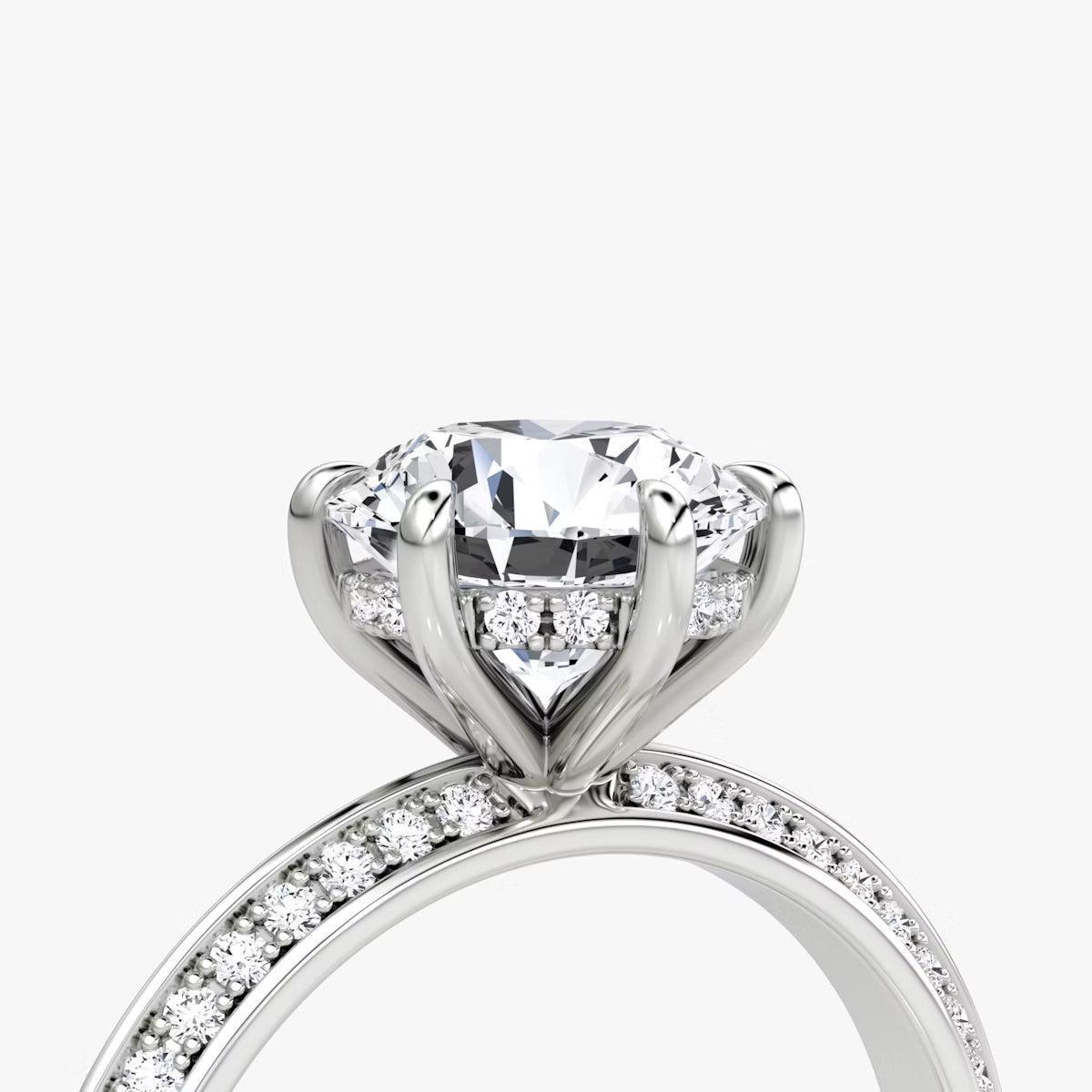 The Sculpted Round Hidden Halo Diamond Ring with Pavé Setting